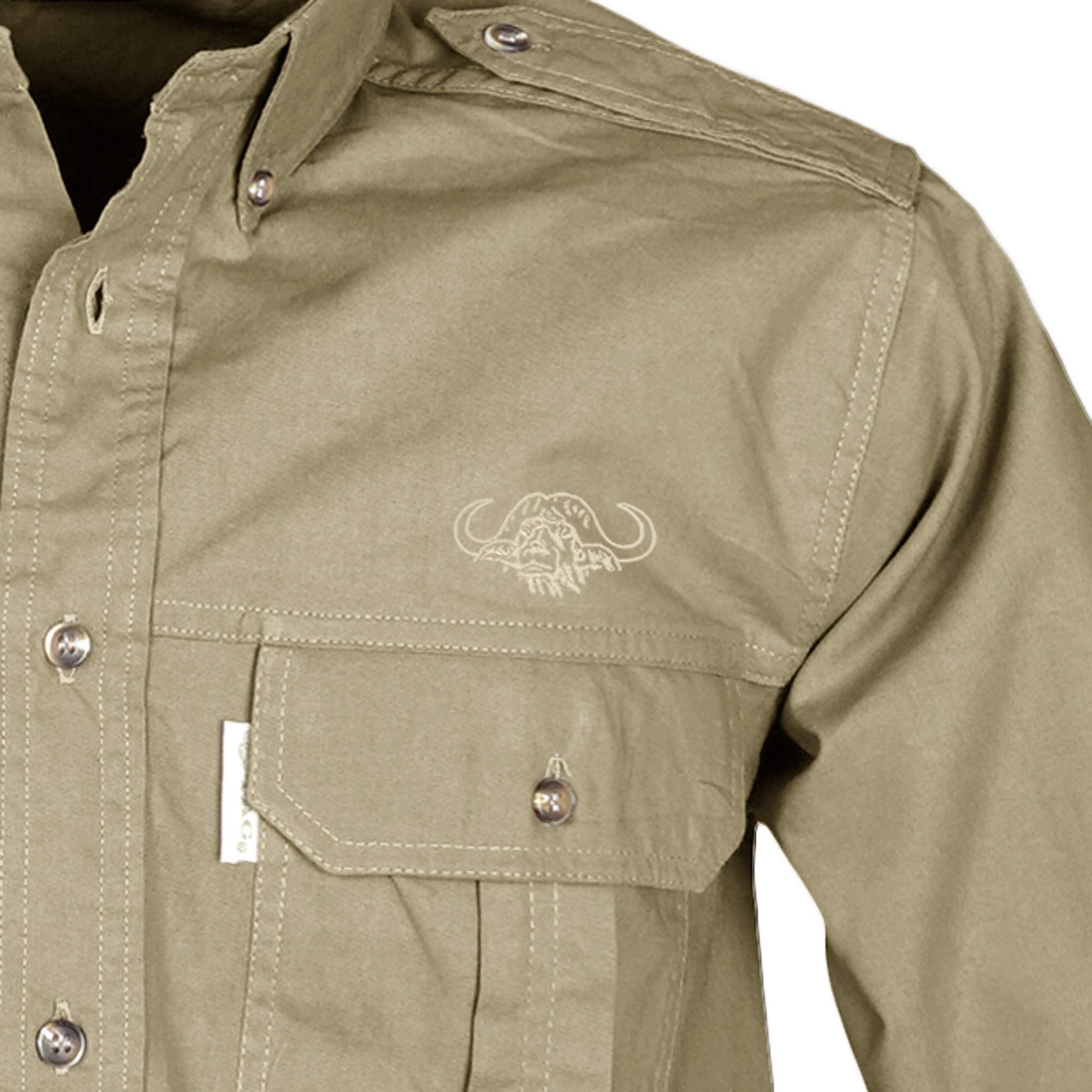 Closeup of a Men's Trail Shirt with Buffalo Logo in Long Sleeves, color Khaki. The shirt has a flap-covered chest pocket on the left side with an embroidered Tag buffalo logo above, button-down collars, functional cross-stitched shoulder straps, a button-front placket, and double stitching throughout. 100% cotton.--3