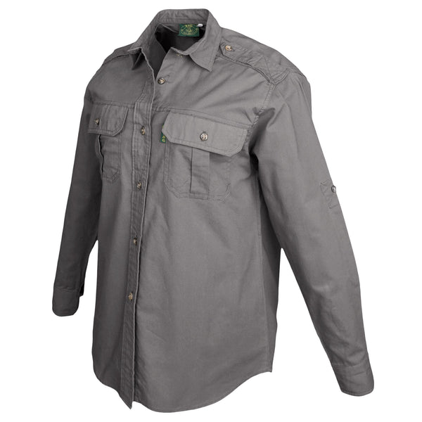 Side view of a Woman's Trail Shirt in Long Sleeves, color Olive. The shirt has two flap-covered chest pockets, functional cross-stitched shoulder straps, a button-front placket, double stitching throughout, and long rounded tails for tucking into pants. 100% cotton.