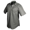 Side view of a Woman's Trail Shirt in Short Sleeves, color Olive. The shirt has two flap-covered chest pockets, functional cross-stitched shoulder straps, a button-front placket, double stitching throughout, and long rounded tails for tucking into pants. 100% cotton.